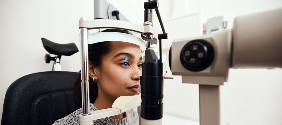 Optometrist performing a comprehensive eye examination
